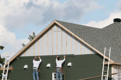 Inspecting the completed siding